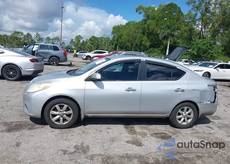2012 Nissan Versa 1.6 Sl z USA, uszkodzony, nr VIN 3N1CN7APXCL909053